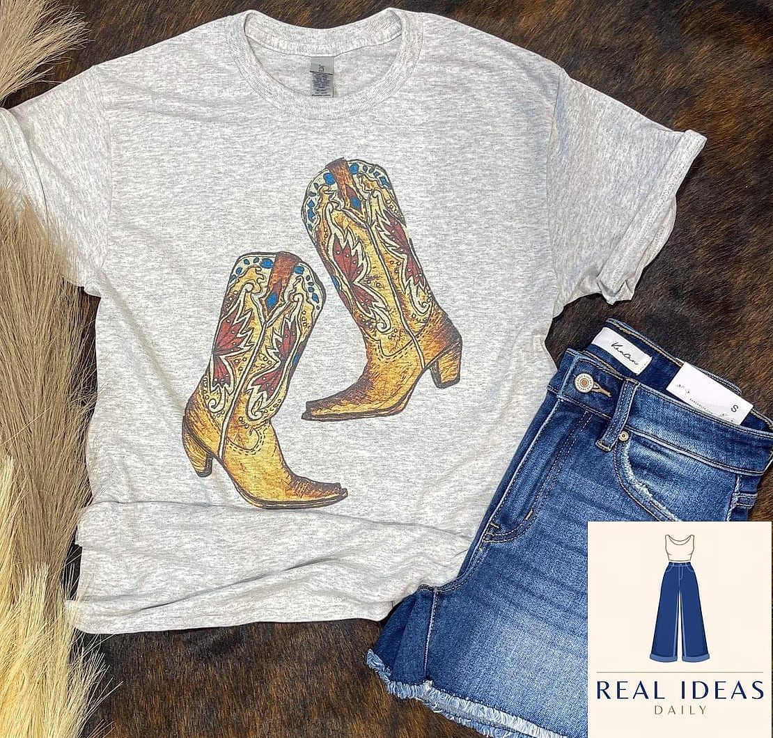 25 Cowgirl Boots Outfit That Are Breathtakingly Beautiful 13 Graphic Tee, Denim Shorts, and Cowgirl Boots for Summer Casual