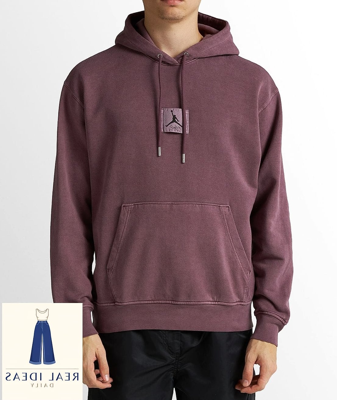 Hoodie Paired with a Statement Bag for Instant Polish