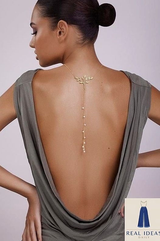 21 Silk Dress Outfit Worth Bookmarking Right Now 22 The Layered Necklace and Backless Silk Dress Look