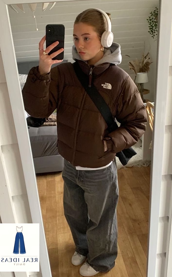Puffer Vest Layered Over a Hoodie with Baggy Jeans