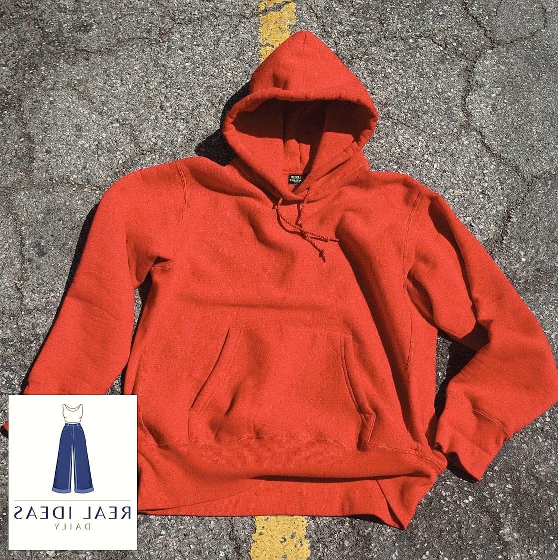 Red Hoodie Under a Trench Coat