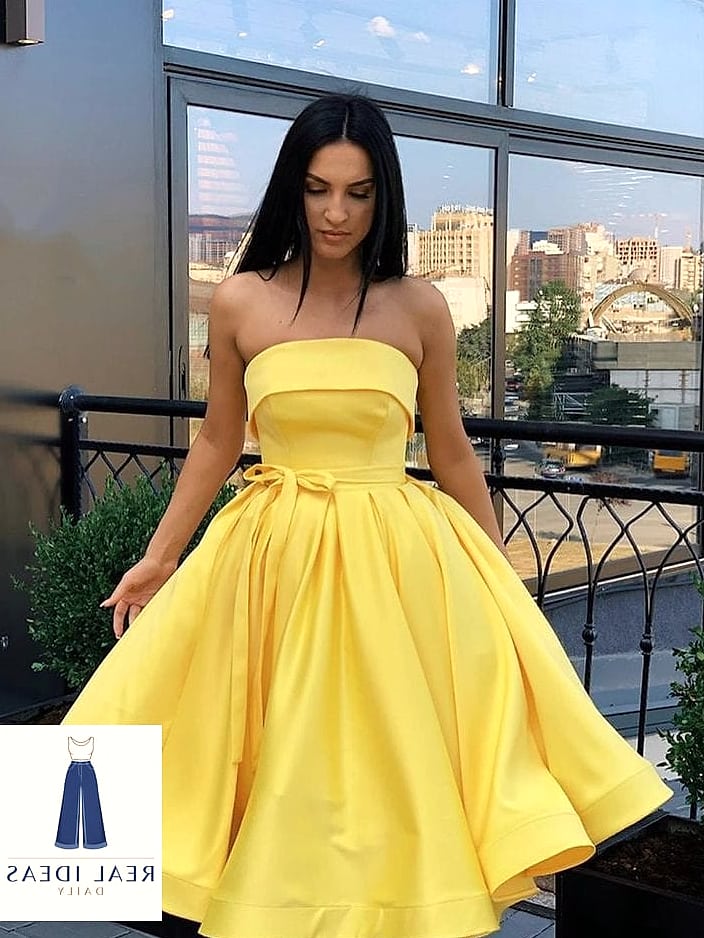29 Yellow Dress Outfit That Are Breathtakingly Beautiful 5 Soften a Yellow Midi Dress With a Denim Jacket